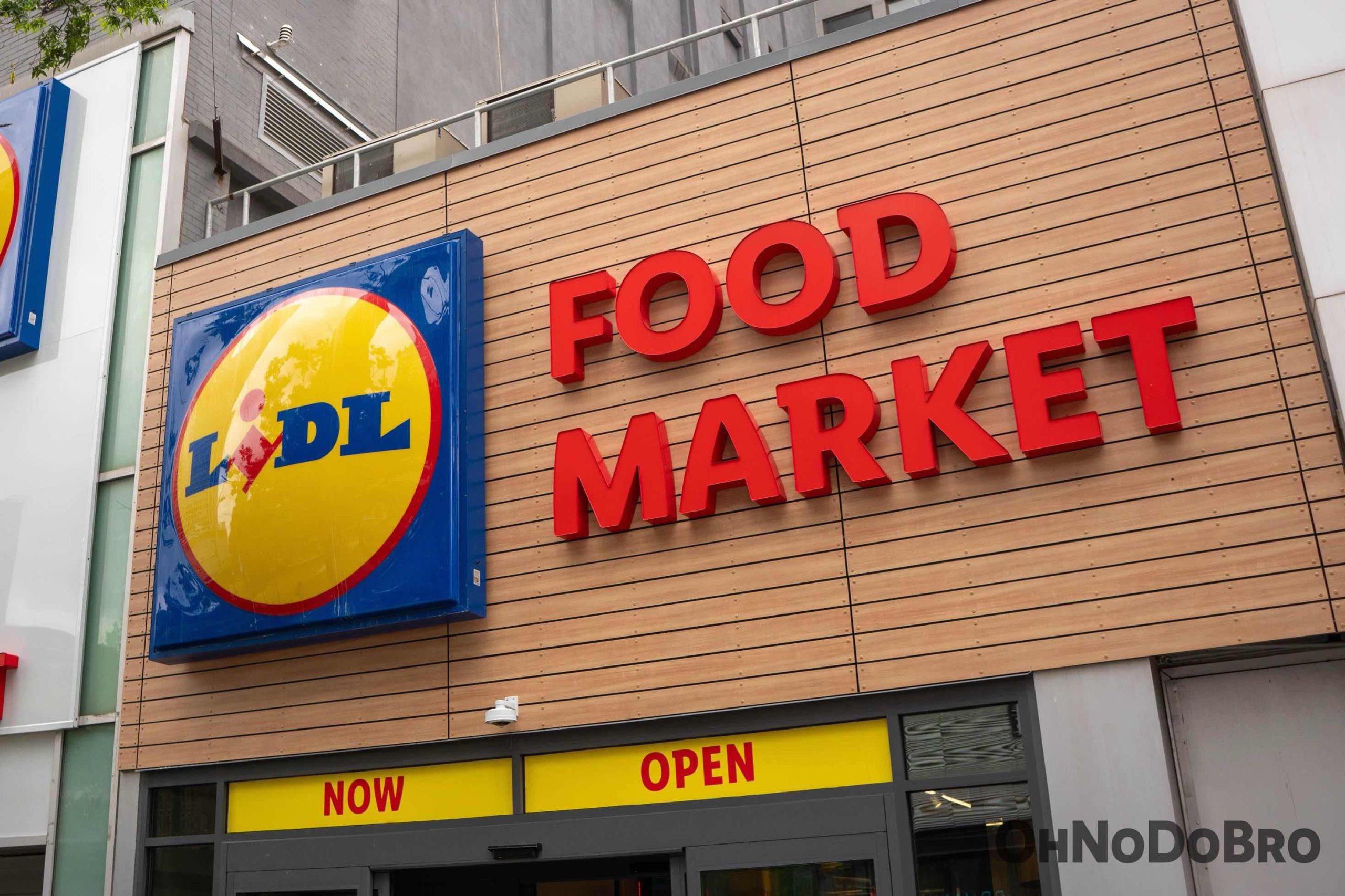Storefront signage for LIDL Food Market on Fulton Street. Sign below says "Now Open"